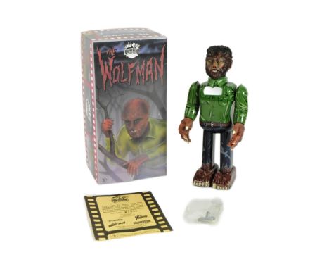 Tinplate Toys - a 1991 Japanese Universal Studios Wolfman wind-up robot. Tested, in excellent, working condition with swingin