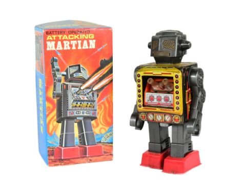 Tinplate Toys - a vintage Japanese SH Horikawa Attacking Martian robot, featuring stop'n go action, shooting guns inside the 