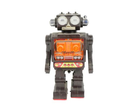 Tinplate Toys - a vintage Japanese Horikawa 'Fighting Robot', featuring plastic body and tinplate chest. Tested and in workin