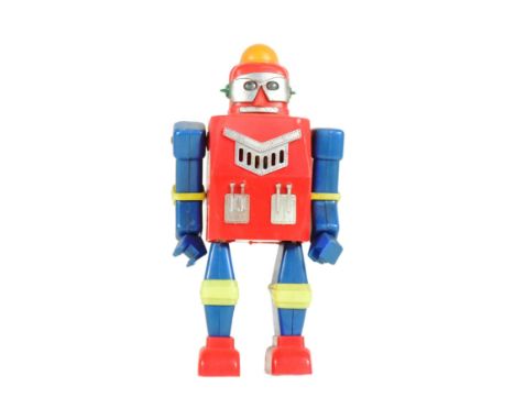Retro Toys - a Hong Kong Cragstan Mr. Flash battery powered robot. Featuring plastic body, walking action and swinging arms. 