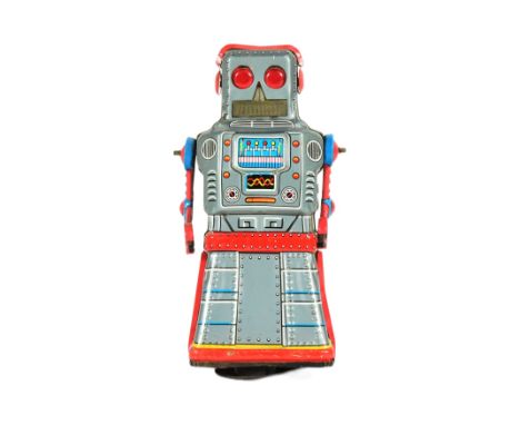 Tinplate Toys - a vintage Japanese KO (Yoshiya) robot, featuring wind-up, moving action. Testing and is in working order. Unb