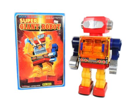 Tinplate Toys - a vintage, battery operated, Japanese SH Rotate-O-Matic Super Giant Robot. With metal torso, legs and plastic