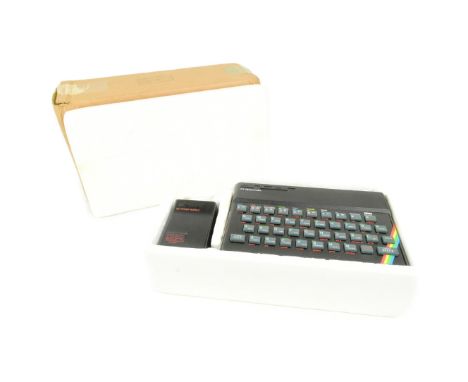 Retro Gaming - a vintage 1980s Sinclair ZX Spectrum 48K personal computer console with Horizons software starter pack, instru