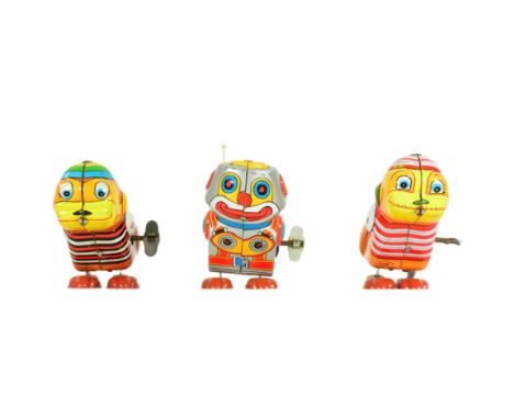 Tinplate Toys - x3 1970s Japanese Yone wind-up hopping robots, featuring x2 hopping monkeys and a clown robot. Tested and all