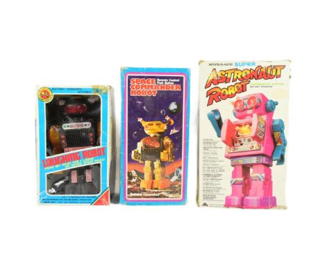 Retro Toys - x3 Vintage battery operated robots, comprising of: 'Laughing Robot' by Yonezawa, 'Space Commander Robot' by Play