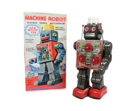 Tinplate Toys - a vintage Japanese, SH Horikawa Machine Robot with visible gears. Featuring warning light helmet, walking act