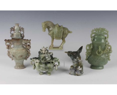 A group of five Chinese jadeite carvings, 20th century and later, comprising two jars and covers, heights 18.5cm and 17.2cm (