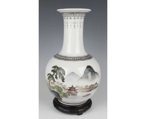 A Chinese porcelain bottle vase, Republic period or slightly later, the globular body painted with fishermen in boats, pavili