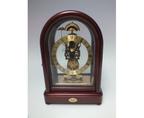 A MODERN KIENINGER SKELETON MANTEL CLOCK, the gilt dial with Roman numerals, incorporating a subsidiary seconds dial, movemen