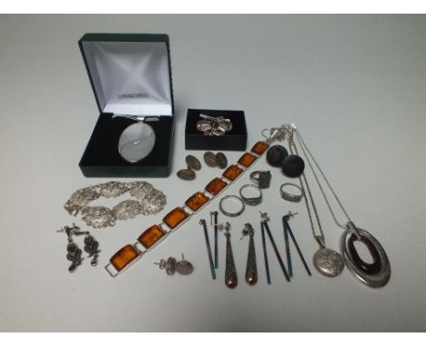 A COLLECTION OF MODERN AND VINTAGE SILVER JEWELLERY, comprising mostly pendants, rings, earrings, and two bracelets, together