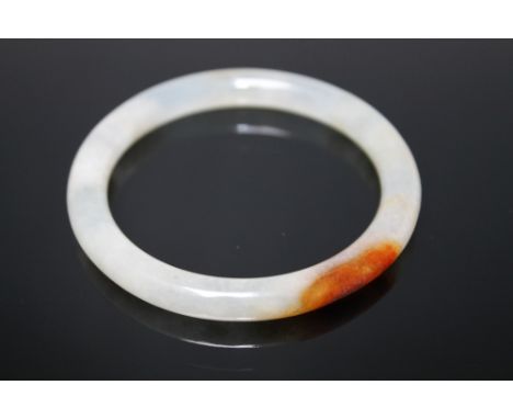 A JADE BANGLE, W 6.75 cm
Buyers - for shipping pricing on this lot, visit www.cuttlestones.co.uk/shipping