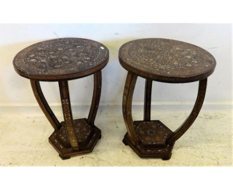 Pair Early C20th North African Occasional Tables with circular tops extensively inlaid with mother of pearl & bone in geometr