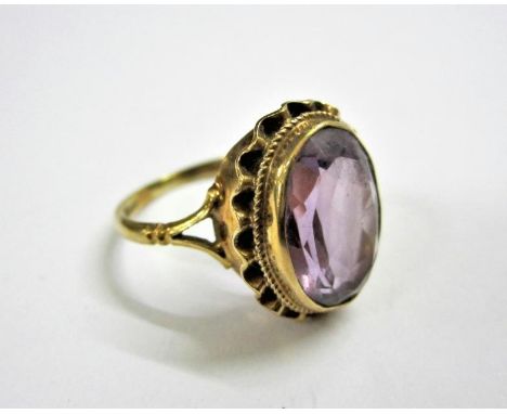 9ct. Gold Amethyst Ring size M 1/2 with central oval amethyst 