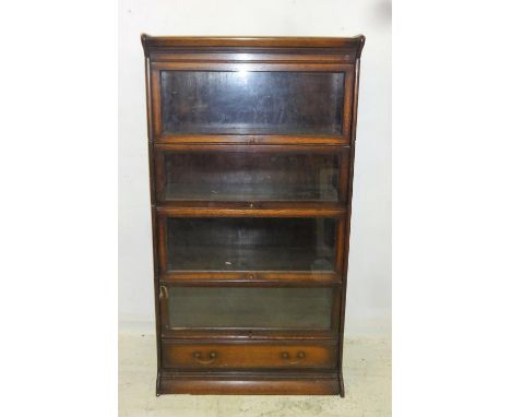 Oak Globe Wernicke Bookcase, lower section with drawer, 4 graduated sections with cornice 