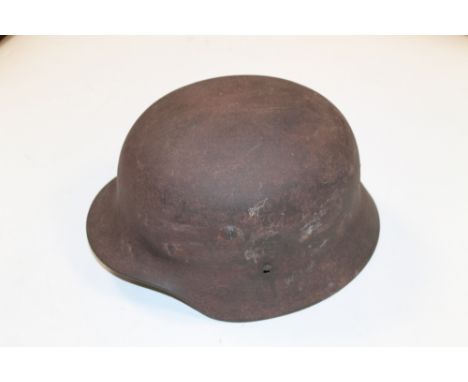 A WWII GERMAN M-40 TYPE HELMET SHELL, no liner