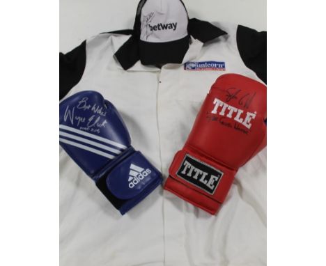 A TITLE BOXING GLOVE SIGNED BY STEVE COLLINS 'THE CELTIC WARRIOR', an Adidas boxing glove signed by Wayne Elcock  'Mad Dog' t