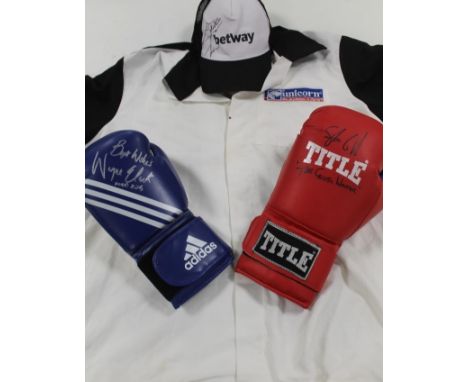 A TITLE BOXING GLOVE SIGNED BY STEVE COLLINS 'THE CELTIC WARRIOR', an Adidas boxing glove signed by Wayne Elcock  'Mad Dog' t