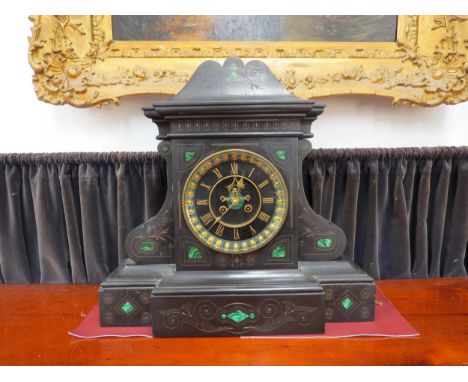 An Impressive late 19th / early 20th Century black Belgium marble mounted clock of architectural form with twin train movemen