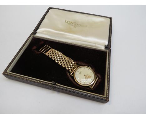 A 9ct gold Longines gentleman's wristwatch, circa 1950's, together with associated Longines case, 42.8g 