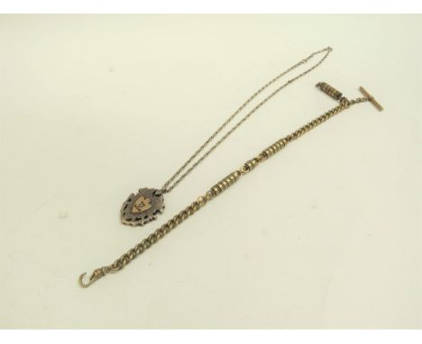 A silver shield pendant on Sterling silver chain and base metal watch chain (2) 