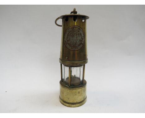 A miners lamp by The Protector Lamp &amp; Lighting Co. Ltd., Eccles, Manchester, Type A.1, 27cm tall 