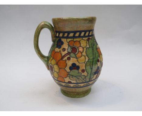 A Charlotte Rhead jug with floral and leaf decoration to body base marked 146, 21.5cm tall 