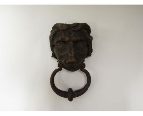 A carved oak lion's head door knocker, 25cm with knocker 