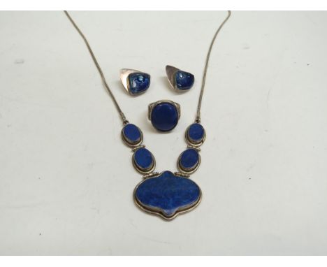 A lapis lazuli necklace, similar earrings and ring 