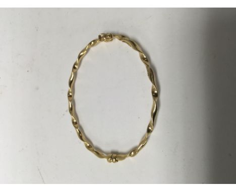 A 9 ct gold bangle 4 grams approx.