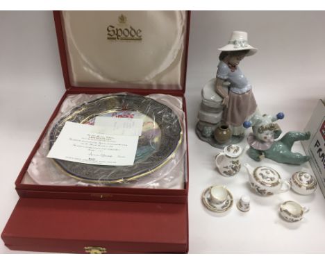 A collection of ceramics including Lladro, Spode and Coalport items.