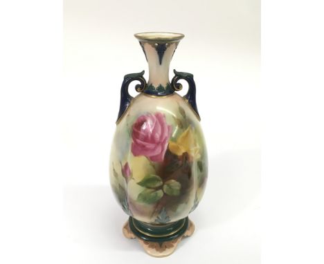 A Royal Worcester vase painted with roses.Approx 20cm