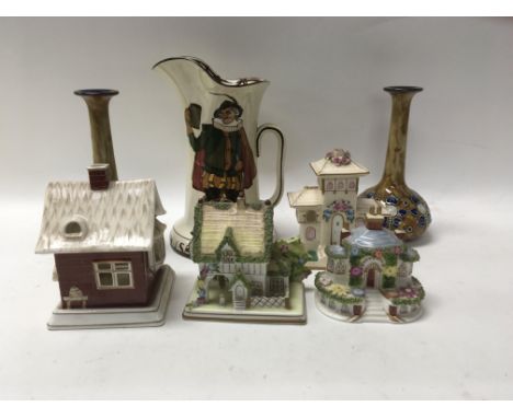 A collection of ceramic comprising a pair of Doulton vases Doulton jug and four pastel burners.