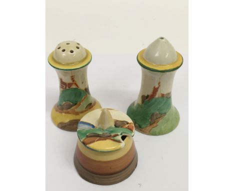 A Clarice Cliff 'Secrets' pattern, three piece cruet set.Approx 7cm high, some restoration.