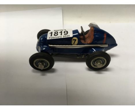 A vintage studio 1050 clockwork schuco racing car
