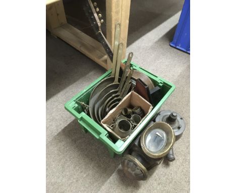 A box containing a brass lamp, some pans, banjo etc.