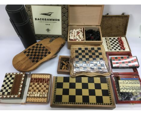 A collection of various chess sets, dominos etc.