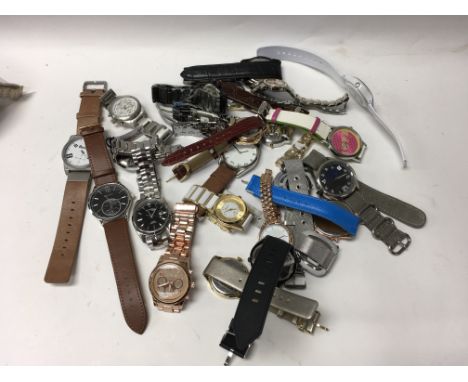 A bag containing a collection of 25 mixed watches including Michael Kors, Bench, Rotary and others.