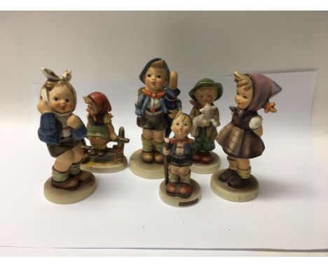 A collection of Goebel figures