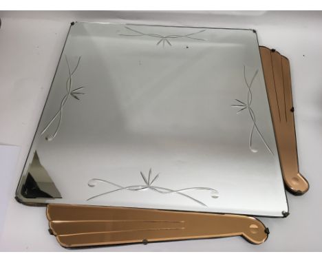 A square, Art Deco, engraved mirror with peach colour surround