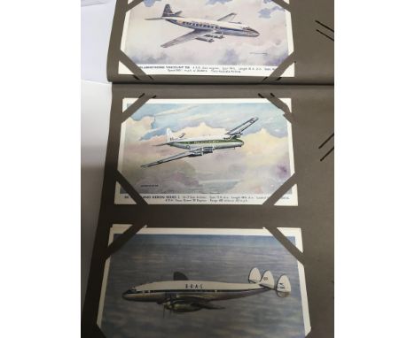 Two albums of Postcards one album with shipping trains and airplanes. the other with vintage comical cards landmarks and stre