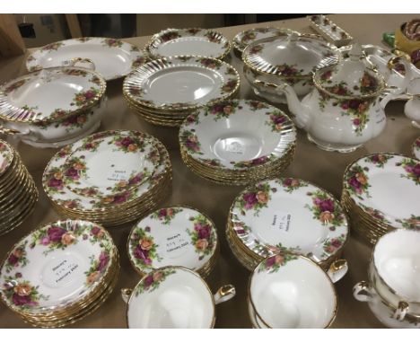 A Royal Albert dinner service comprising plates, tureens, cups, saucers, posy vase, teapot, coffee pot, milk jug, sugar bowl 