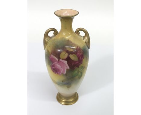 A Royal Worcester small vase painted with roses.Approx 15cm, restored.