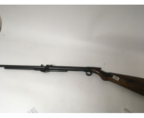 A Vintage BSA .22 under-leaver air gun with a mahogany stock blued steel action and barrel serial number S20030.
