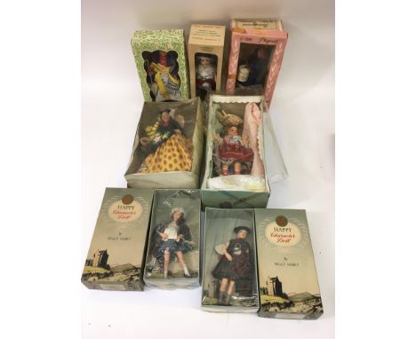 A box containing vintage tourist dolls including two by Peggy Nisbet - NO RESERVE
