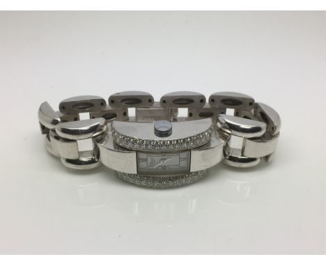 An 18ct white gold ladies Chopard watch set with diamonds, approx 2ct.