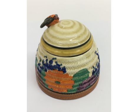 A Clarice Cliff 'Gayday' honey pot of ribbed form. Approx 10cm