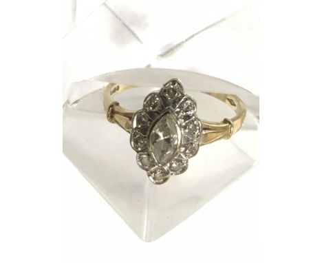 A 9ct ring set with diamonds in pear shape mount.Approx 0/R, 2.5g