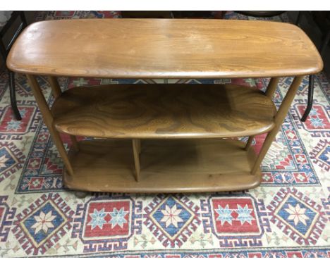 An Ercol light wood trolley stand.Approx 31x71cm, some wear