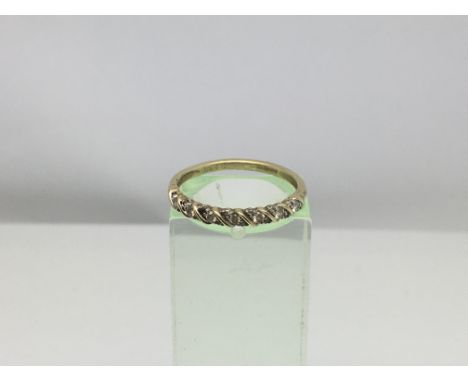 A 9ct gold ring set with diamonds, approx 1.3g and approx size N.