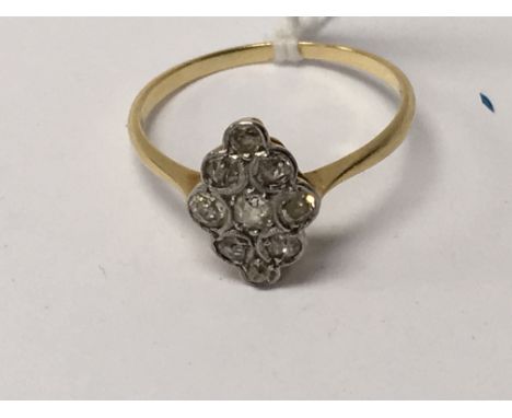 A 18 ct gold ring inset with diamonds.